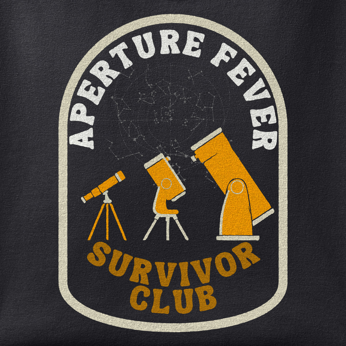Close-up of the Aperture Fever Survivor Club print showing ink detail on black cotton fabric