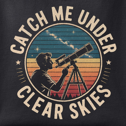 Close-up of the Catch Me Under Clear Skies print showing ink detail on black cotton fabric