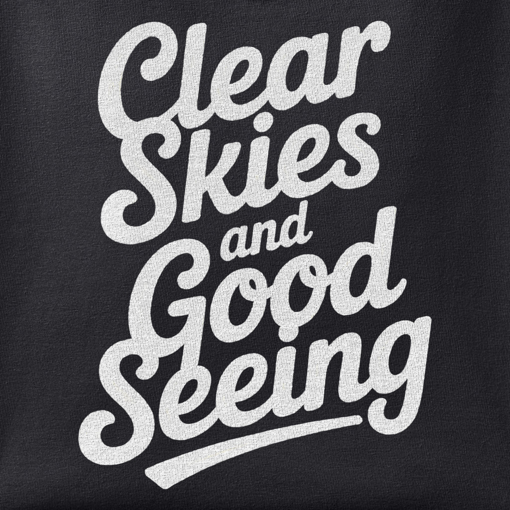 Close-up of the Clear Skies and Good Seeing print showing ink detail on black cotton fabric