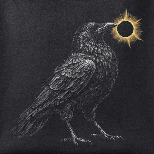 Close-up of the Crow and the Eclipse print showing ink detail on black cotton fabric