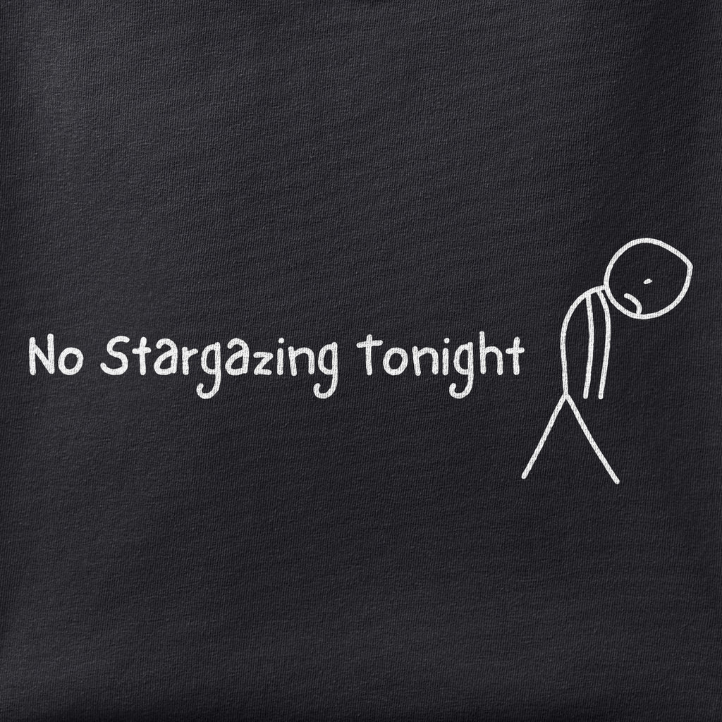 Close-up of the No Stargazing Tonight print showing ink detail on black cotton fabric