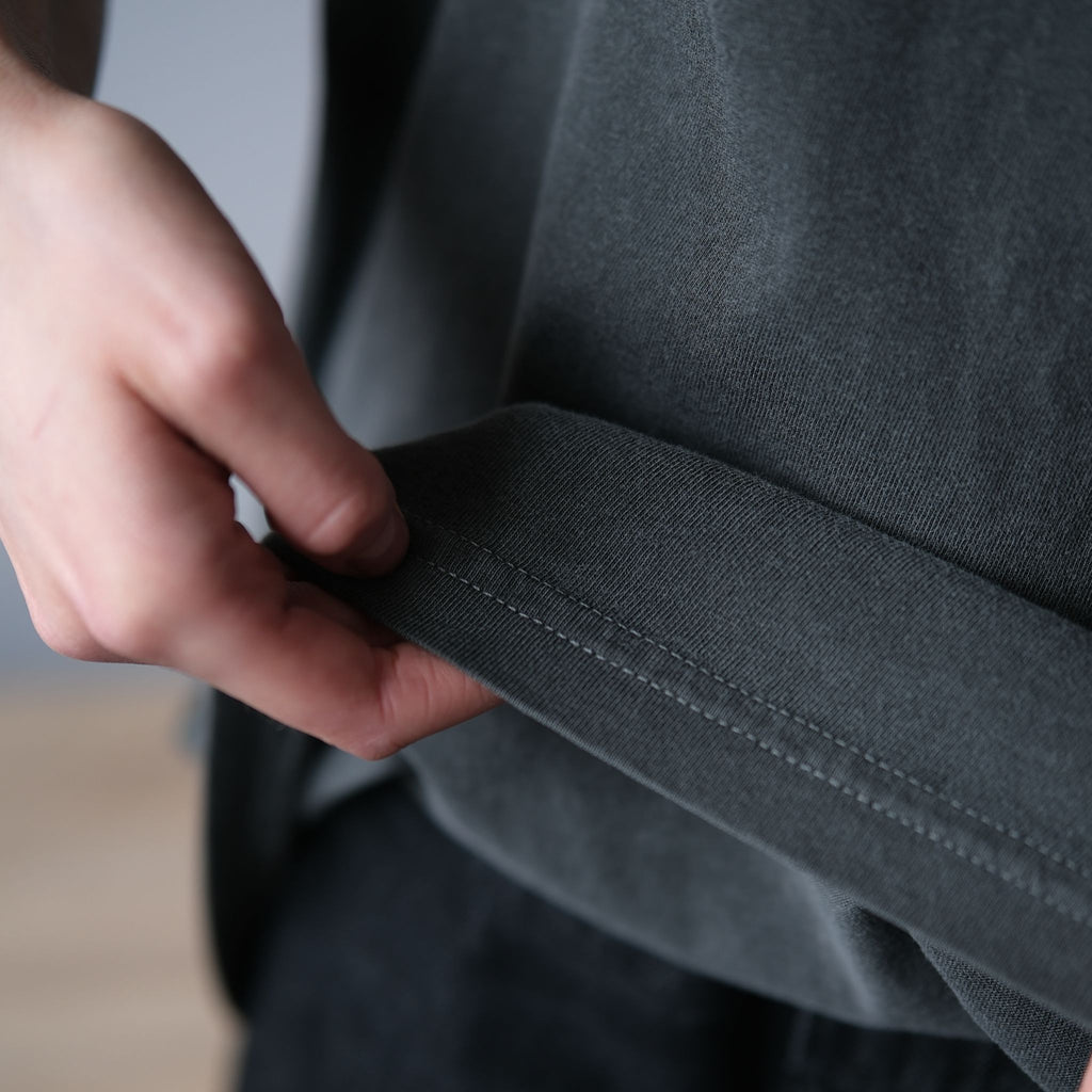 Close-up of the double-stitched bottom hem on the Comfort Colors 1717 tee