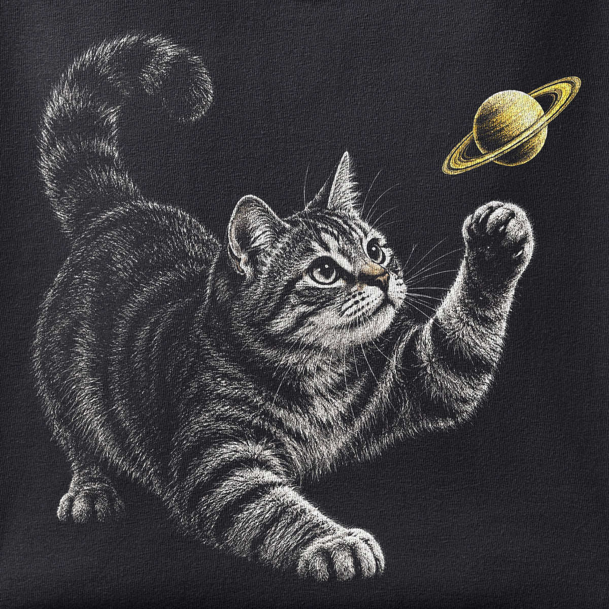 Close-up of the Saturn Cat print showing ink detail on black cotton fabric