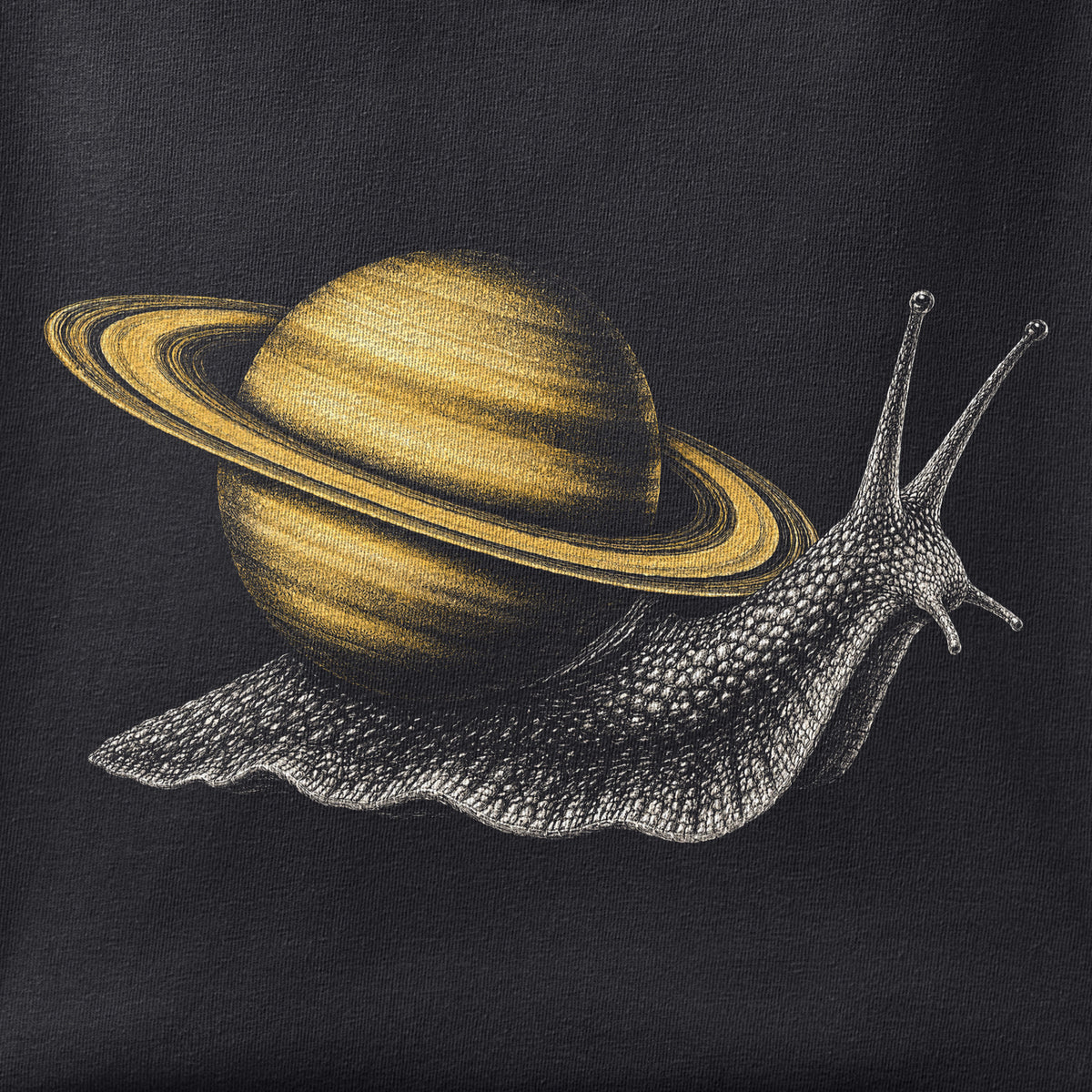 Close-up of the Saturn Snail print showing ink detail on black cotton fabric