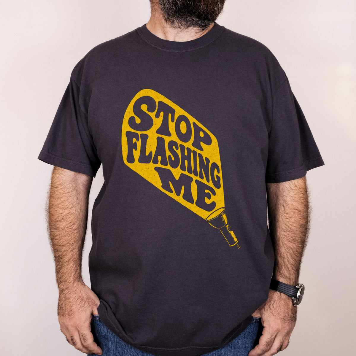 Worn: Stop Flashing Me printed on a Comfort Colors 1717 tee