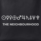 Close-up of the The Neighbourhood print showing ink detail on black cotton fabric