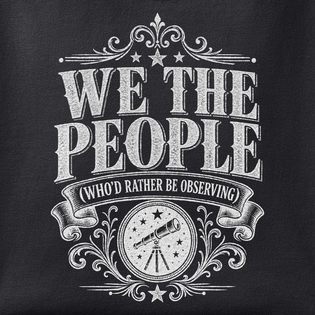 Close-up of the We the People print showing ink detail on black cotton fabric